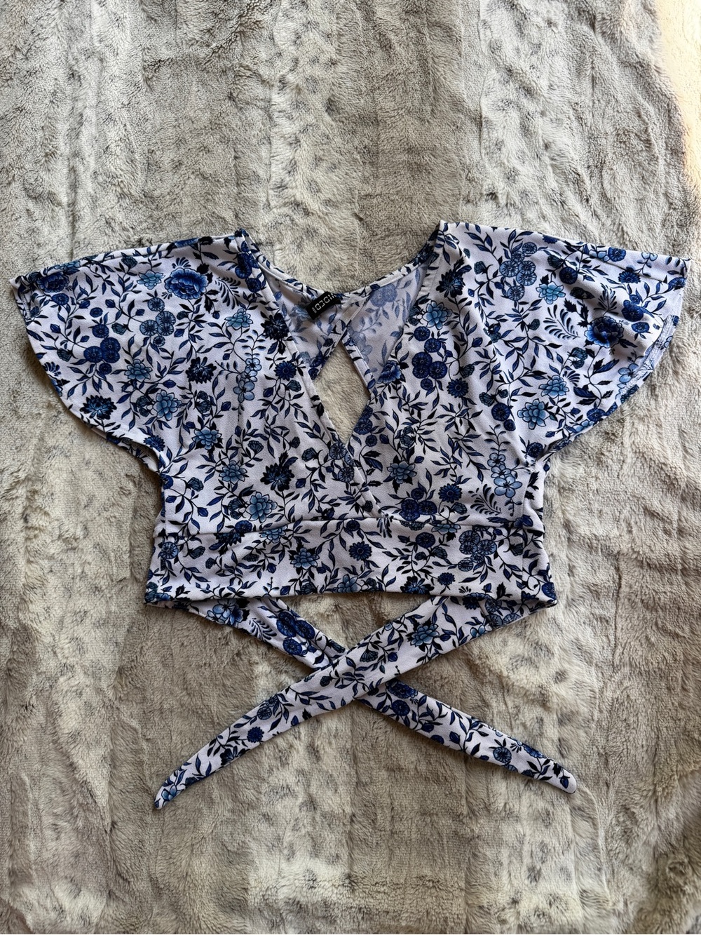 Cropped Wrap Tie-back White and Blue Floral Print Blouse
